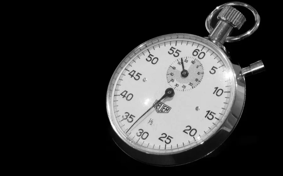 A stopwatch on a black background
